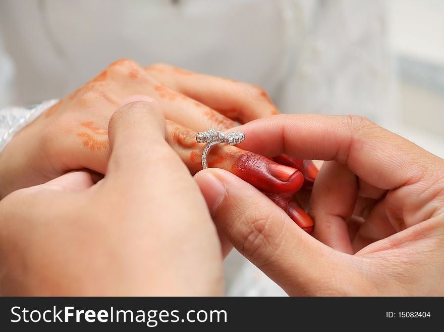 Wear wedding ring ceremony in asian people