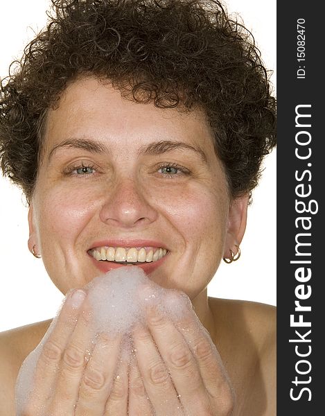 Woman on a white background washes foam. Woman on a white background washes foam