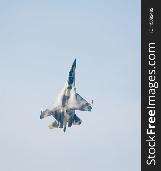 A photograph of a jet airplane Su-35. A photograph of a jet airplane Su-35.