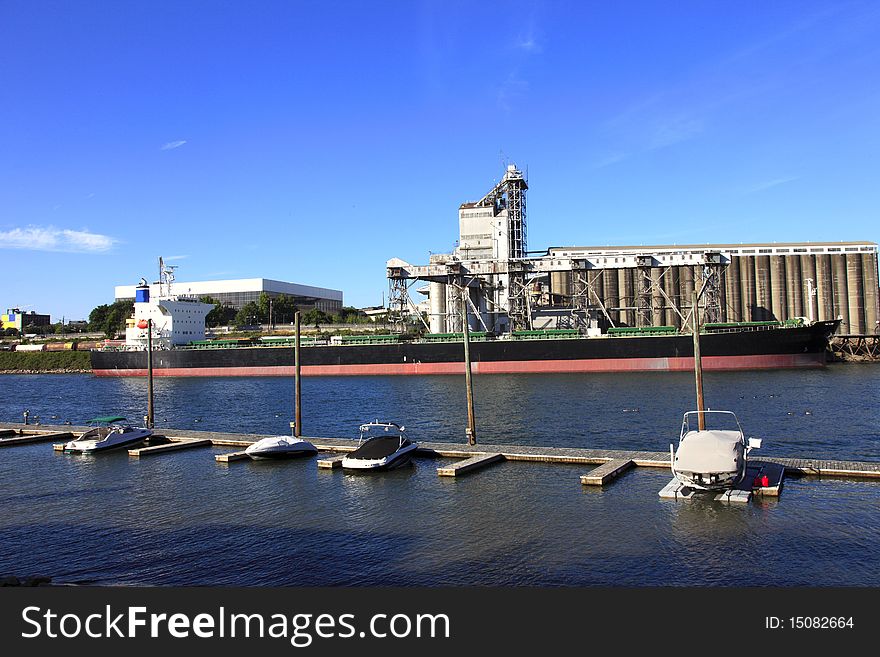 Cargo ship & grain elevator.