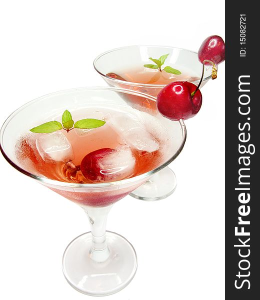 Alcohol liqueur cocktails with ice and cherry. Alcohol liqueur cocktails with ice and cherry