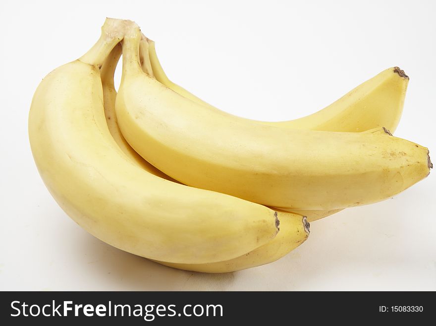 Close-up fresh bunch of bananas isolated on white background