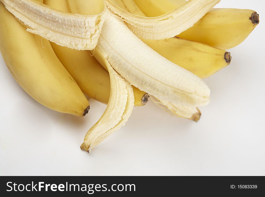 Close-up fresh bunch of bananas isolated on white background