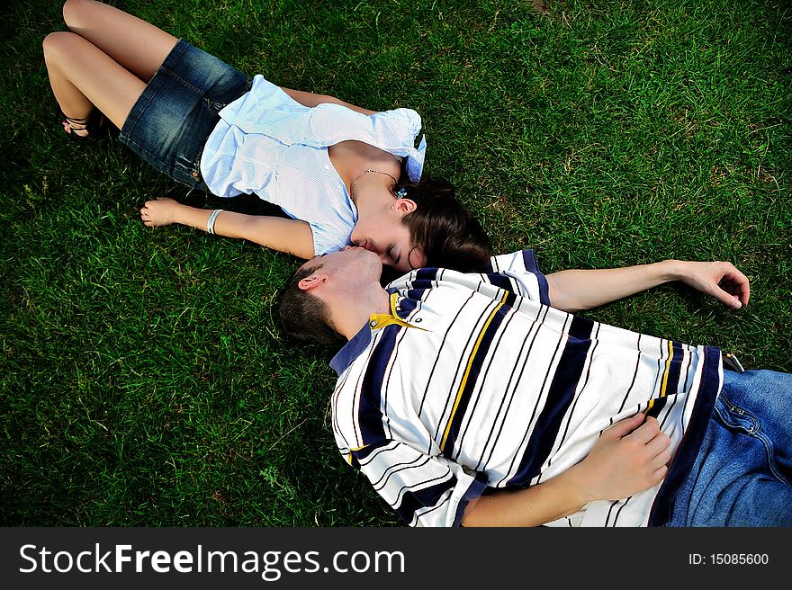 Couple outdoor, kissing and celebrating love. Couple outdoor, kissing and celebrating love