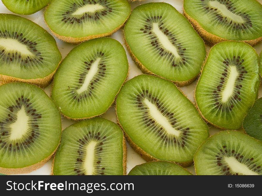 Freshness ripe slices of kiwi in isolated over white