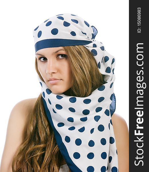 Young girl in blue polka dot kerchief looks at the camera. Young girl in blue polka dot kerchief looks at the camera
