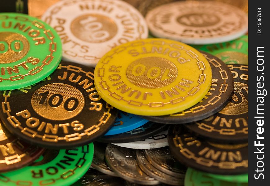 Close-up of colorful gambling counters. Close-up of colorful gambling counters.