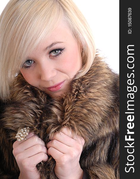 Photograph showing pretty blond woman holding fur coat isolated. Photograph showing pretty blond woman holding fur coat isolated