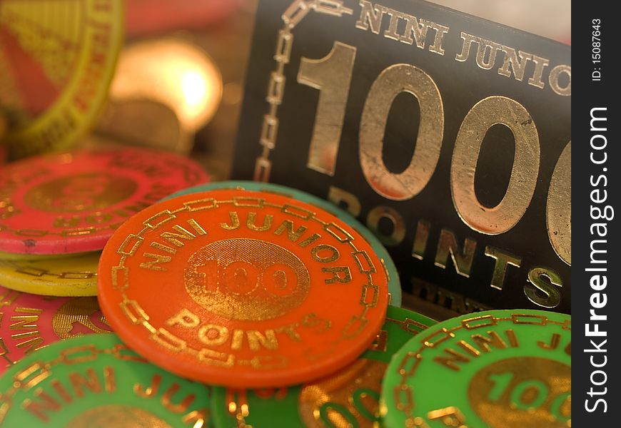 Close-up of colorful gambling counters. Close-up of colorful gambling counters.