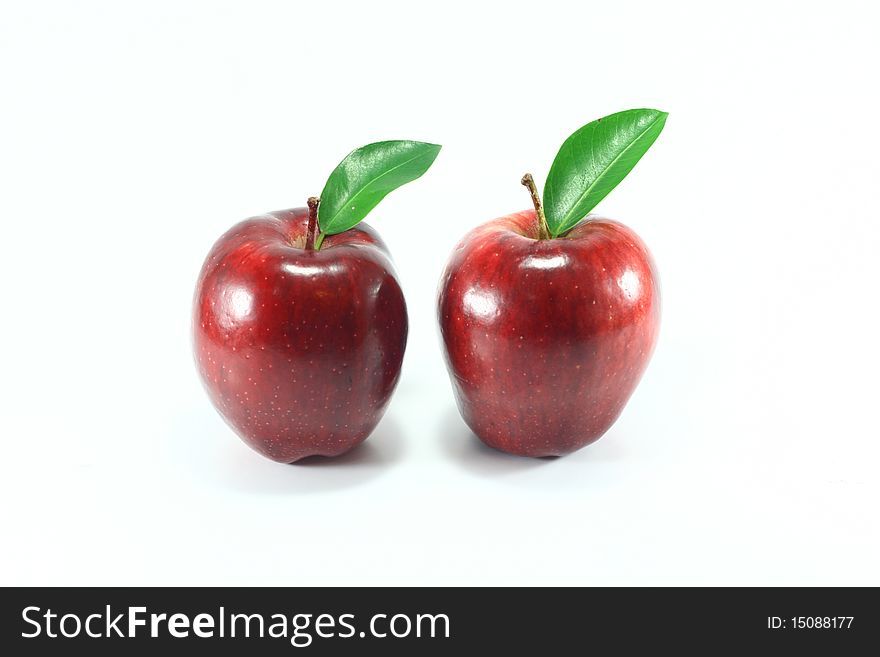 Double the red apple on white background. Double the red apple on white background