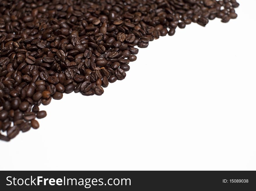 Coffee beans isolated on white with copyspace