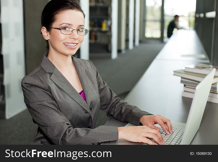Business woman working at a desk