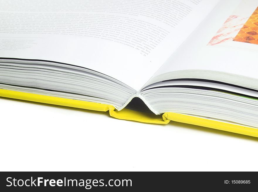 Close up of open text book isolated. Close up of open text book isolated