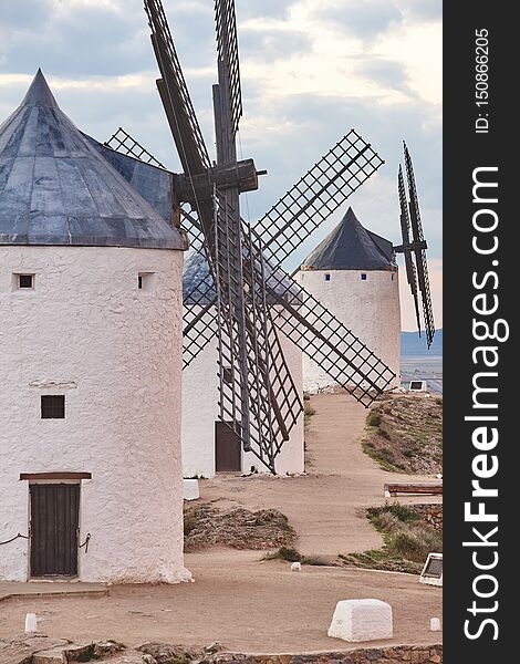 Traditional antique windmills at sunset in Spain. Consuegra, Toledo. Travel