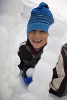 Young Boy Behind Snowball Wall Royalty Free Stock Image Young Boy Behind Snowball Wall Royalty Free Stock Image