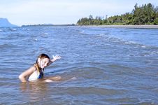 The Girl Learns To Swimm In The Sea. Royalty Free Stock Photos The Girl Learns To Swimm In The Sea. Royalty Free Stock Photos
