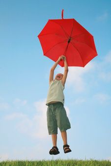 6 Years Boy Flying With Umbrella Stock Image 6 Years Boy Flying With Umbrella Stock Image