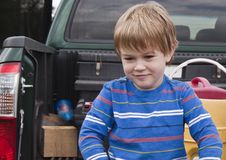 Young Boy Sitting On A Pickup Bed Stock Photography Young Boy Sitting On A Pickup Bed Stock Photography