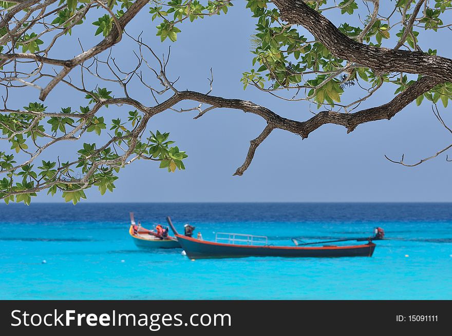 Long-tailed boat infront of koh si, Similan island, Phang-nga, Thailand