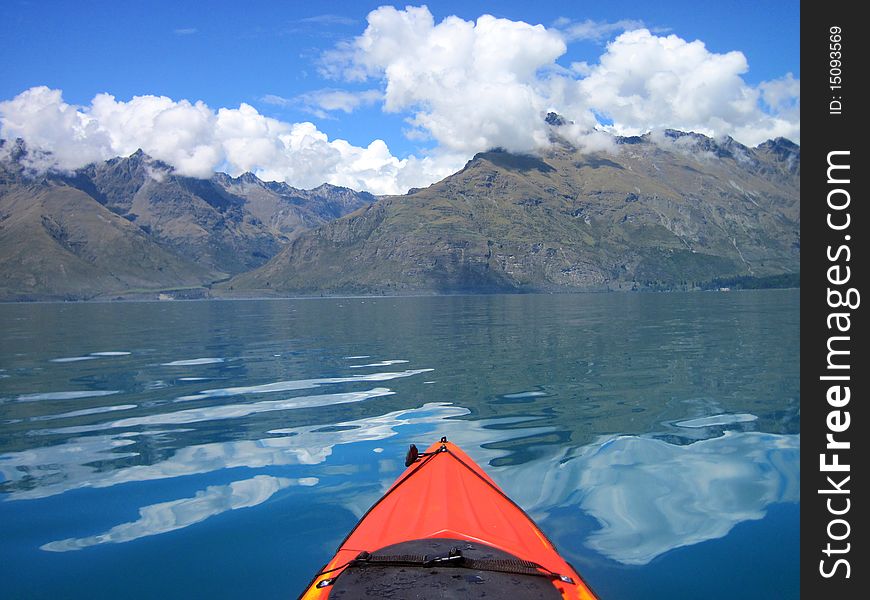 Kayaking accross Lake Wakatipu on a clean crisp day, New Zealand. Kayaking accross Lake Wakatipu on a clean crisp day, New Zealand.