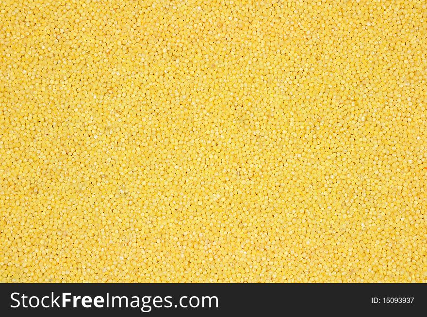 Background of natural fresh yellow millet groats. Background of natural fresh yellow millet groats