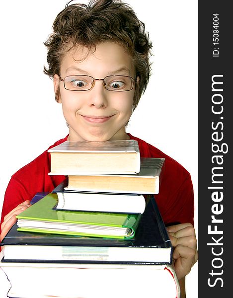 Funny boy wearing glasses with set of books isolated. Funny boy wearing glasses with set of books isolated