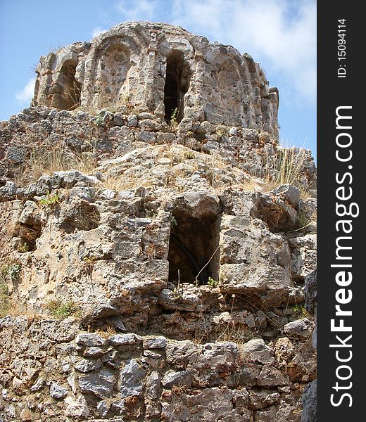 The castle was built on the remnants of earlier Byzantine era and Roman era fortifications. The castle is located 250 meters high on a rocky peninsula jutting into the Mediterranean Sea. Ruins of a Byzantine church located in the castle. The castle was built on the remnants of earlier Byzantine era and Roman era fortifications. The castle is located 250 meters high on a rocky peninsula jutting into the Mediterranean Sea. Ruins of a Byzantine church located in the castle