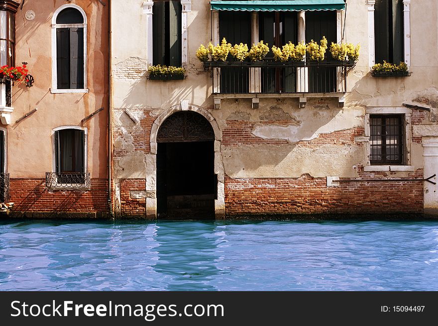 Water on threshold of house in Venice