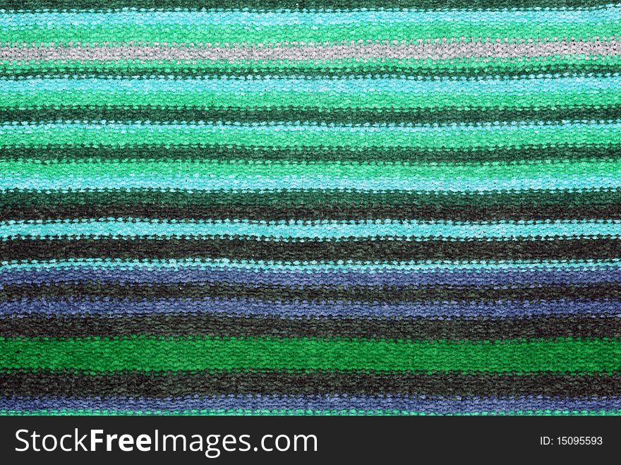 Nice closeup knitting texture with multicolored stripes