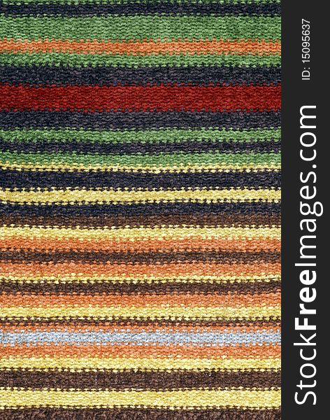 Closeup vertical knitting texture with multicolored horizontal stripes