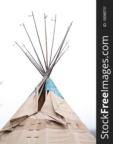 The top poles and ribbons of a native american teepee. The poles are the structure with hides stretched, flaps are designed to let the smoke out and close against the elements Ribbons are to distract the birds from landing. The top poles and ribbons of a native american teepee. The poles are the structure with hides stretched, flaps are designed to let the smoke out and close against the elements Ribbons are to distract the birds from landing