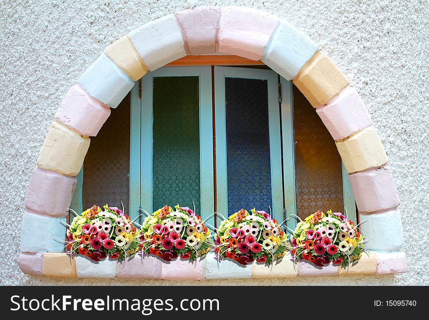 Brickbat window with beautiful flowers