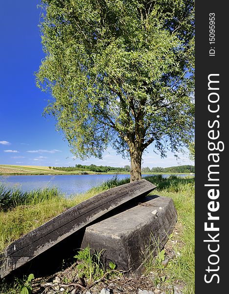 Old wooden boats beside the lake