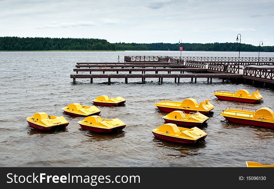Yellow Pedal Boats for rent at lake. Yellow Pedal Boats for rent at lake