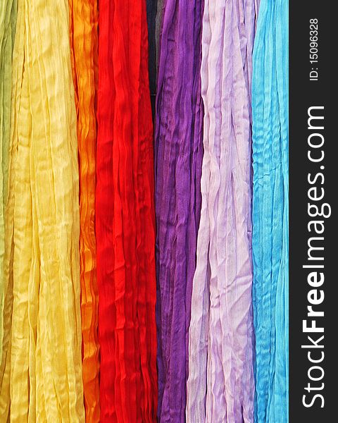 Scarves in different bright colors. Scarves in different bright colors