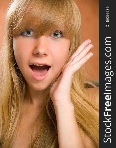 Headshot of a excited young teenage model with a surprised expression. Headshot of a excited young teenage model with a surprised expression.