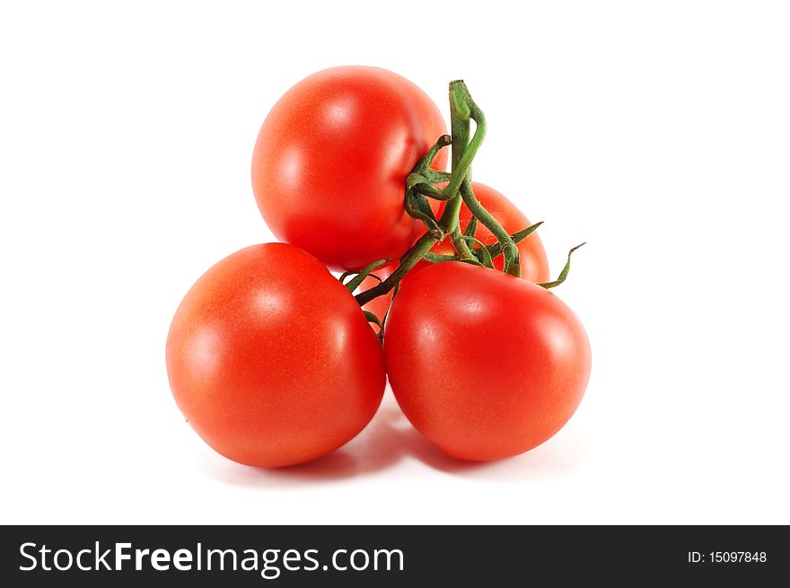 Sheaf of ripe tomatoes isolated on a white background