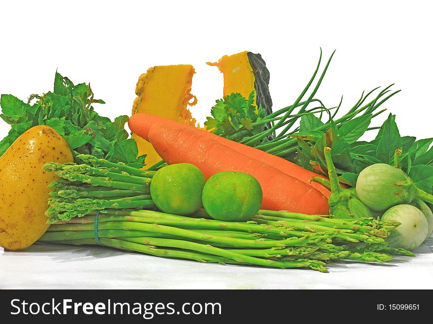 Many fresh vegetables on white background.