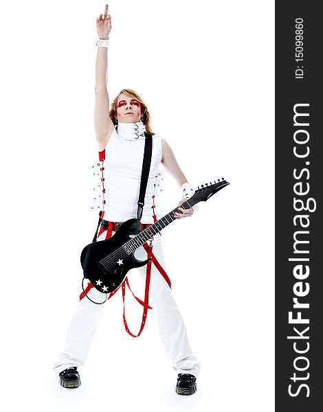 Rock musician is playing electrical guitar. Shot in a studio. Rock musician is playing electrical guitar. Shot in a studio.