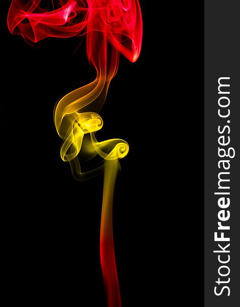 Smoke texture background graphic resources with Spain colors flag mix, red and yellow. Smoke texture background graphic resources with Spain colors flag mix, red and yellow