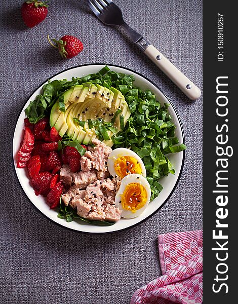 Tuna Strawberry Avocado Egg And Spinach Salad In Bowl - Healthy Food.