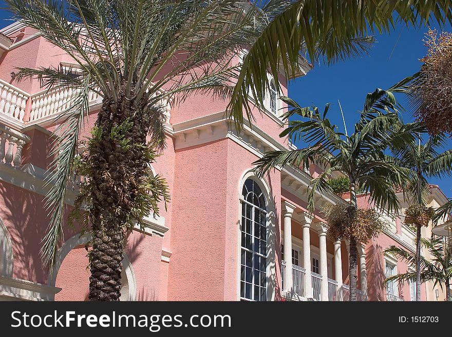 Spanish Architecture Against Blue Sky with Palm Trees