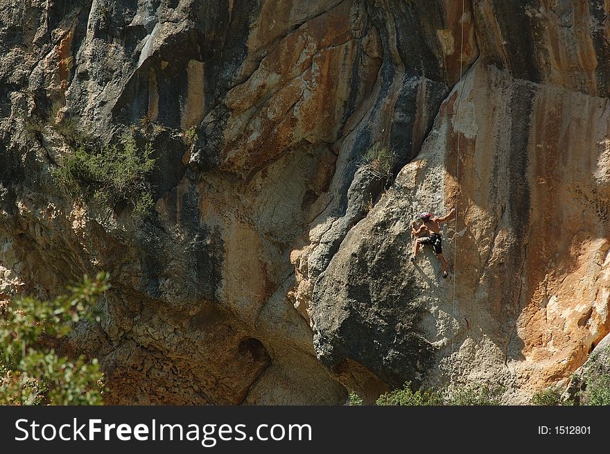 A climber in AlfarrÃ s, LLeida, Spain. A climber in AlfarrÃ s, LLeida, Spain