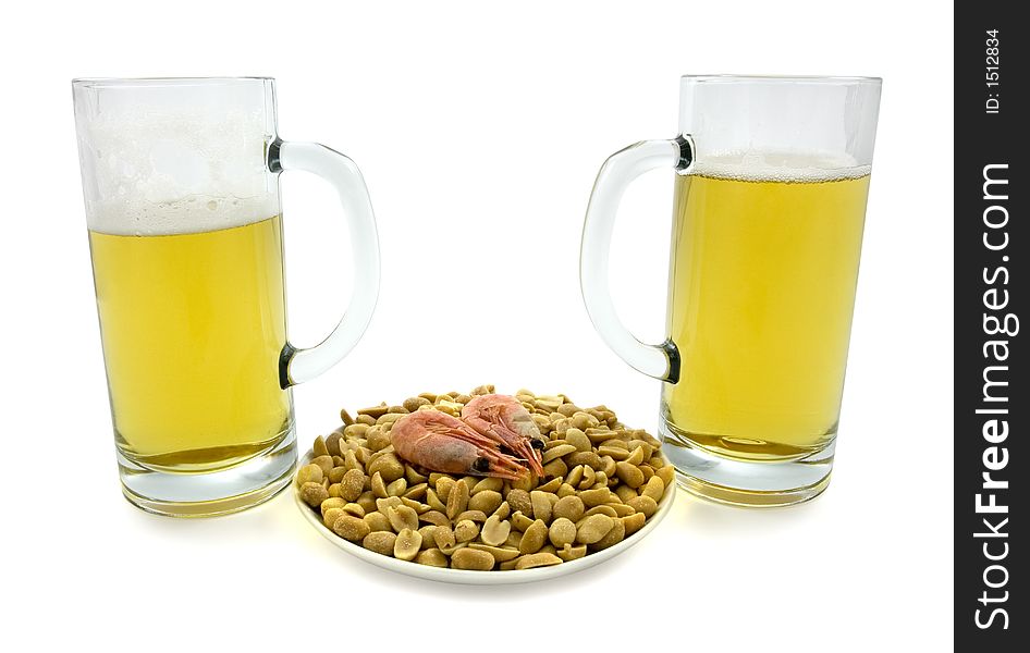 Two mugs of beer and plate with snacks. Clipping path included.