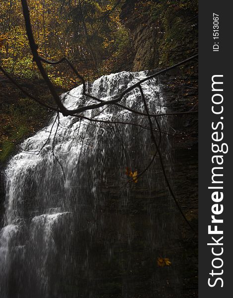 Rushing waterfall with autumn colours. Rushing waterfall with autumn colours