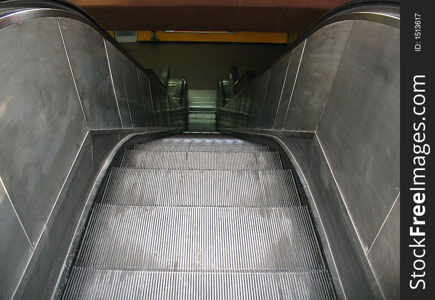 An urban electric subway staircase