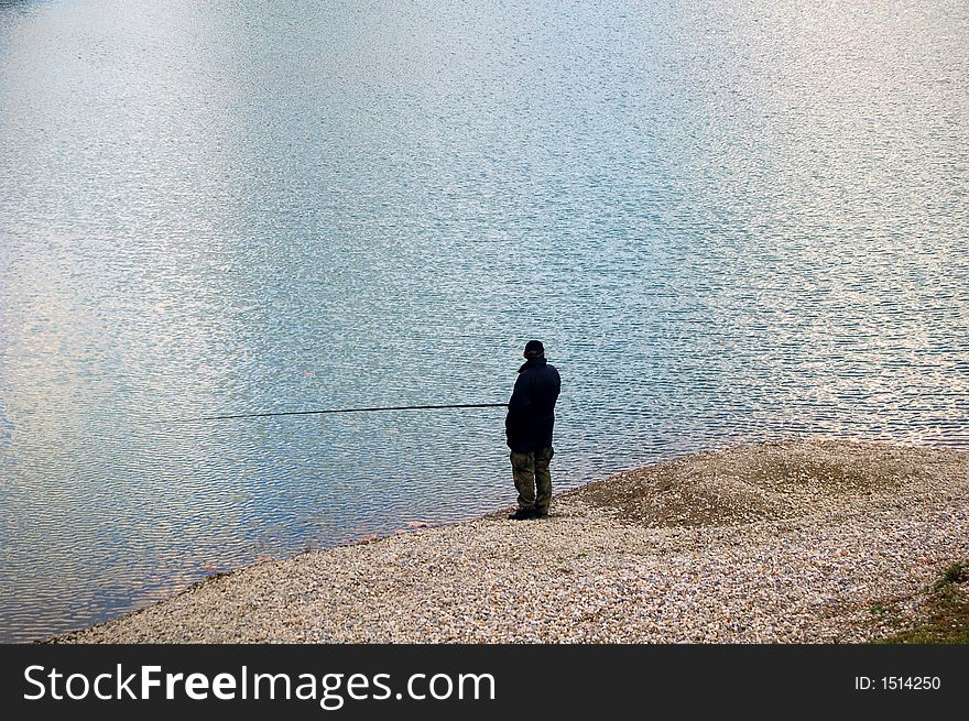 Fisherman on the lake Bundek in Zagreb.
