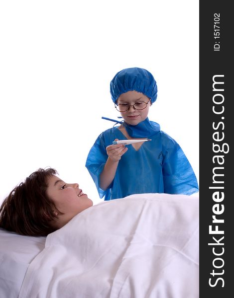 Young doctor, dressed in scrubs, taking the temperature of his patient. Isolated against a white backdrop.