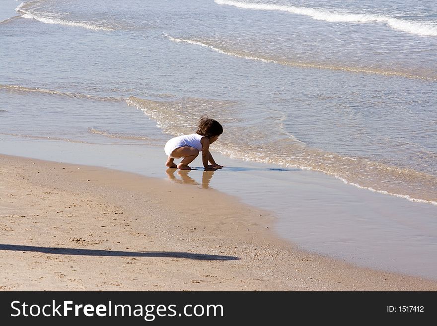 Little girl on the beach.