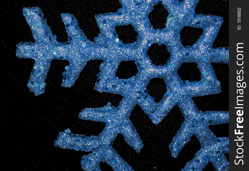 Glittery blue star nowflake ornament. Glittery blue star nowflake ornament